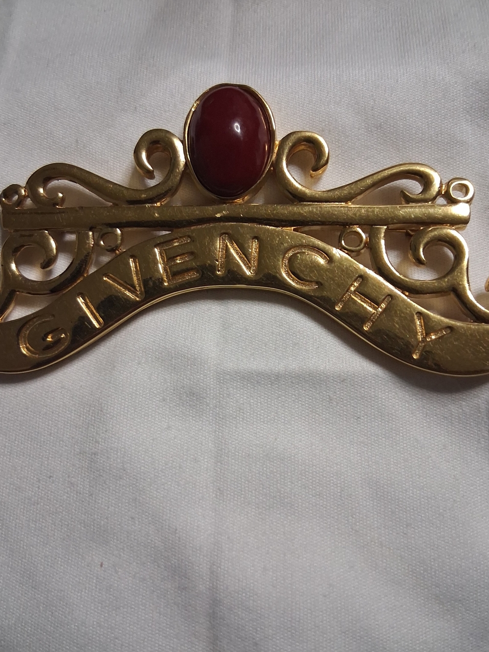 Givenchy Gold-Tone Logo Plaque with Deep Red Cabochon